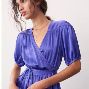 Anthropology wrap around dress in purple. Size M.